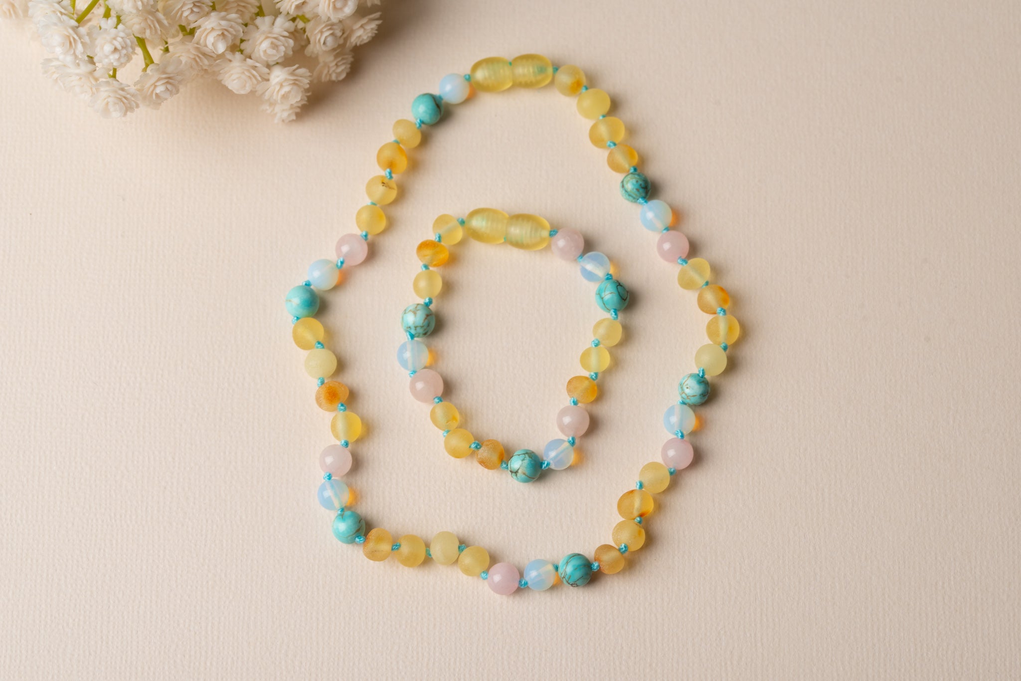 Baltic Amber Teething & Pain Jewelry in 'Tiffany'