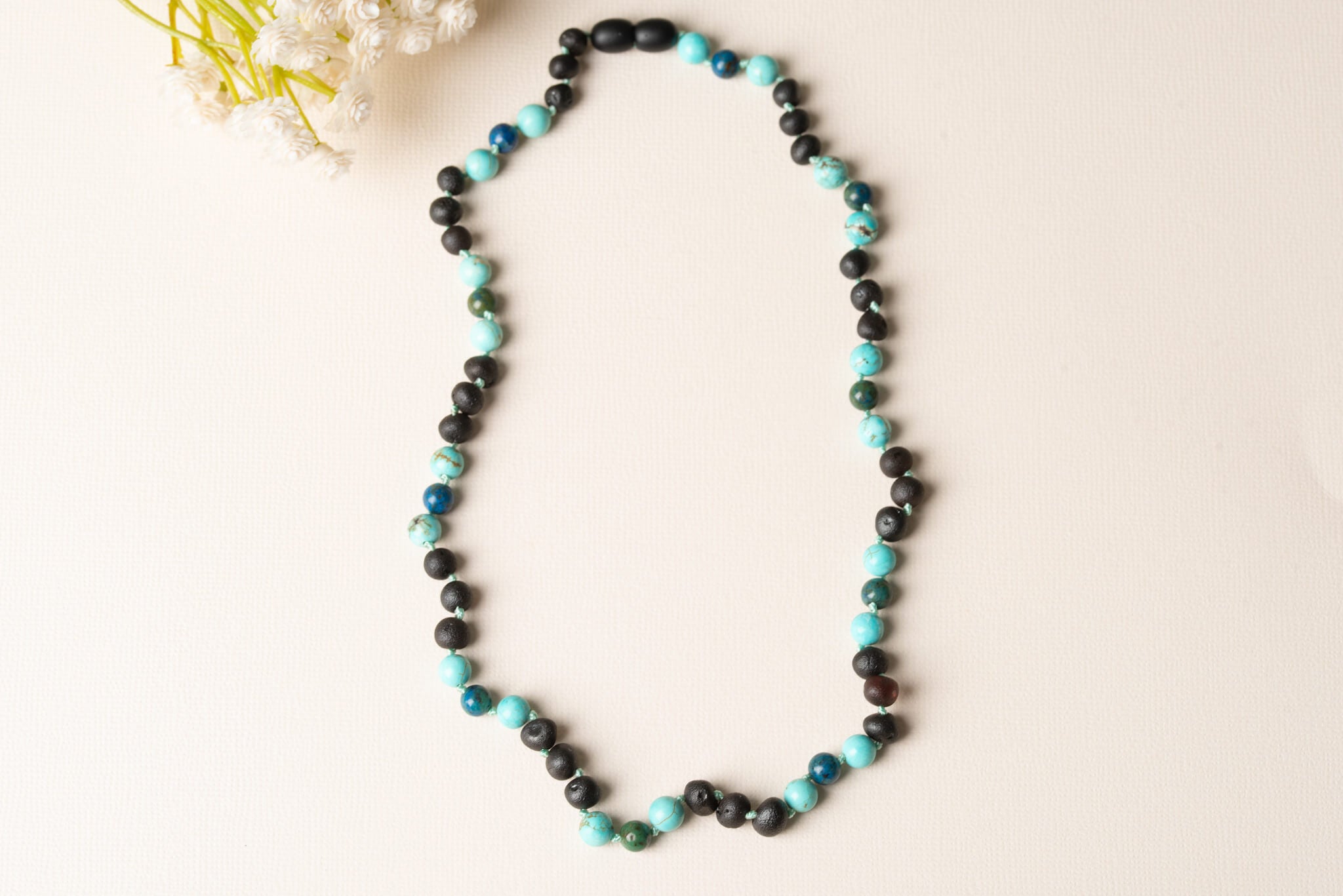 Do Amber Necklaces Work for Teething Pain? - ParentData